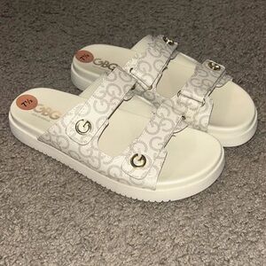 G by Guess White Double-Strap Logo Slide Sandals with Gold Accents
